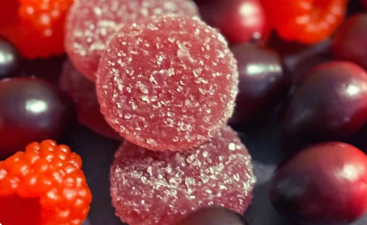 A delicious image of berry-flavored gummies available at Budr Cannabis.