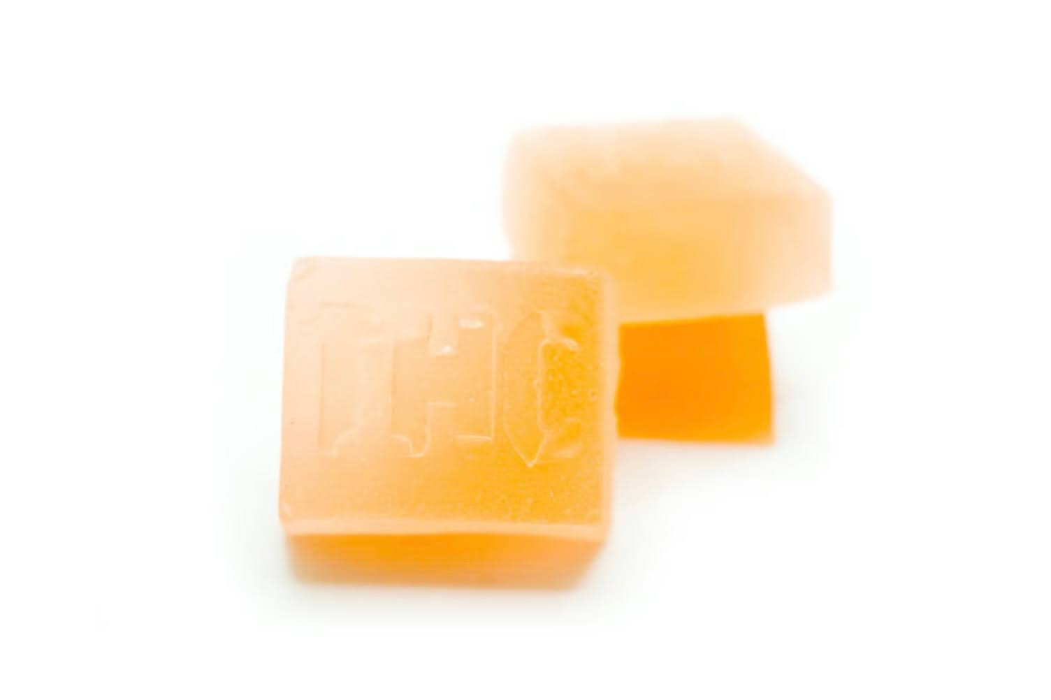 Delicious orange-flavored gummies available at Budr Cannabis. 